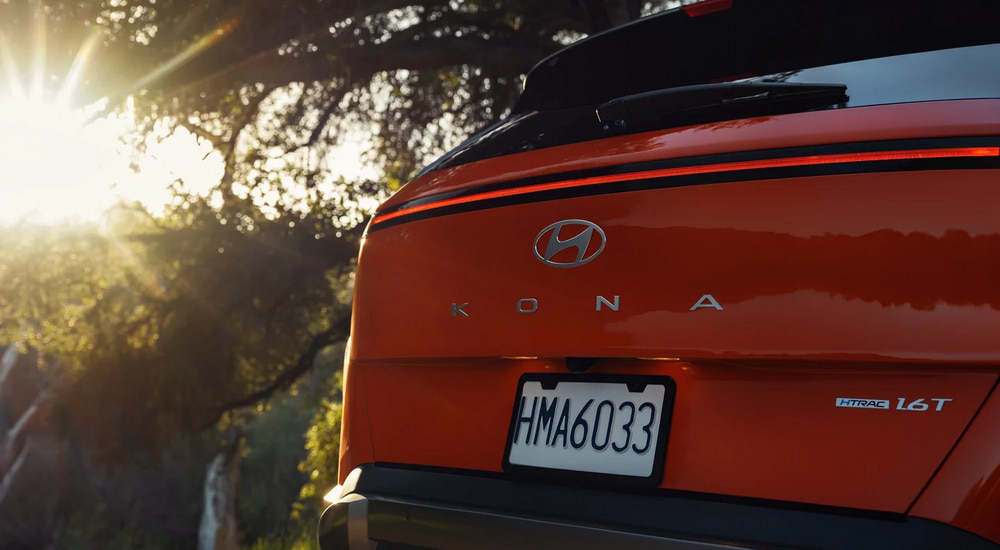 Rear of an orange 2026 Hyundai Kona