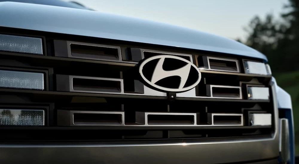 The grille on a blue 2026 Hyundai Santa Cruz.