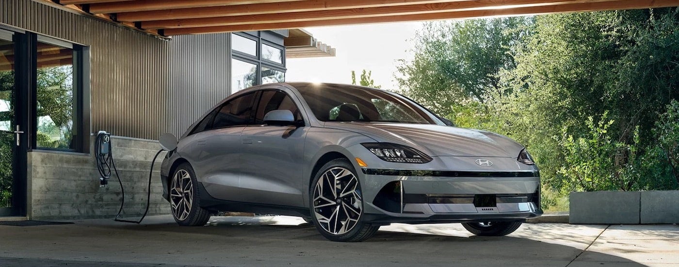 A silver 2023 Hyundai Ioniq 6 is shown from the front at an angle.