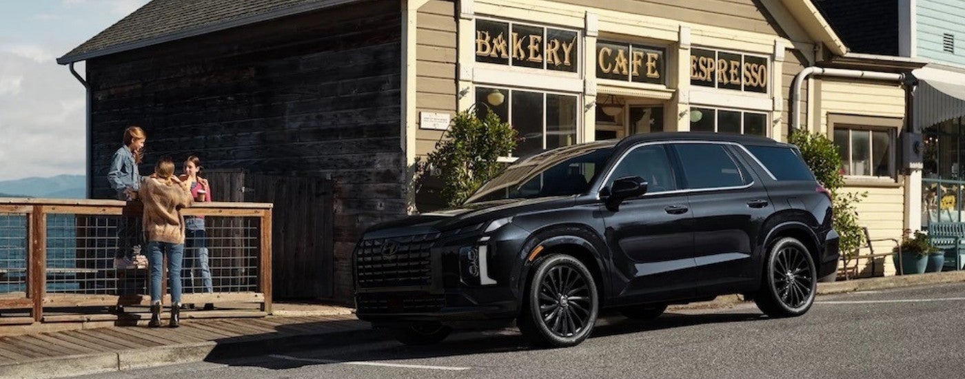 A black 2025 Hyundai Palisade for sale near Powell from the side.