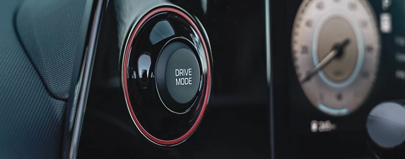 A close up of the drive mode button in a 2024 Hyundai Elanta N-Line.